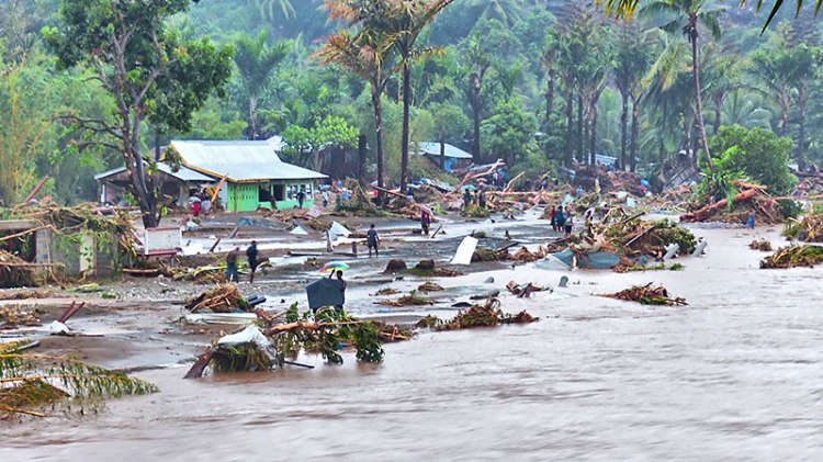 Huge amounts of debris were swept downstream in the flood and ended up on the banks of the Mataniko River (Courtesy T. Bansby)